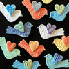 Handmade bird magnets by the potters of Lorraine Oerth &amp; Co.