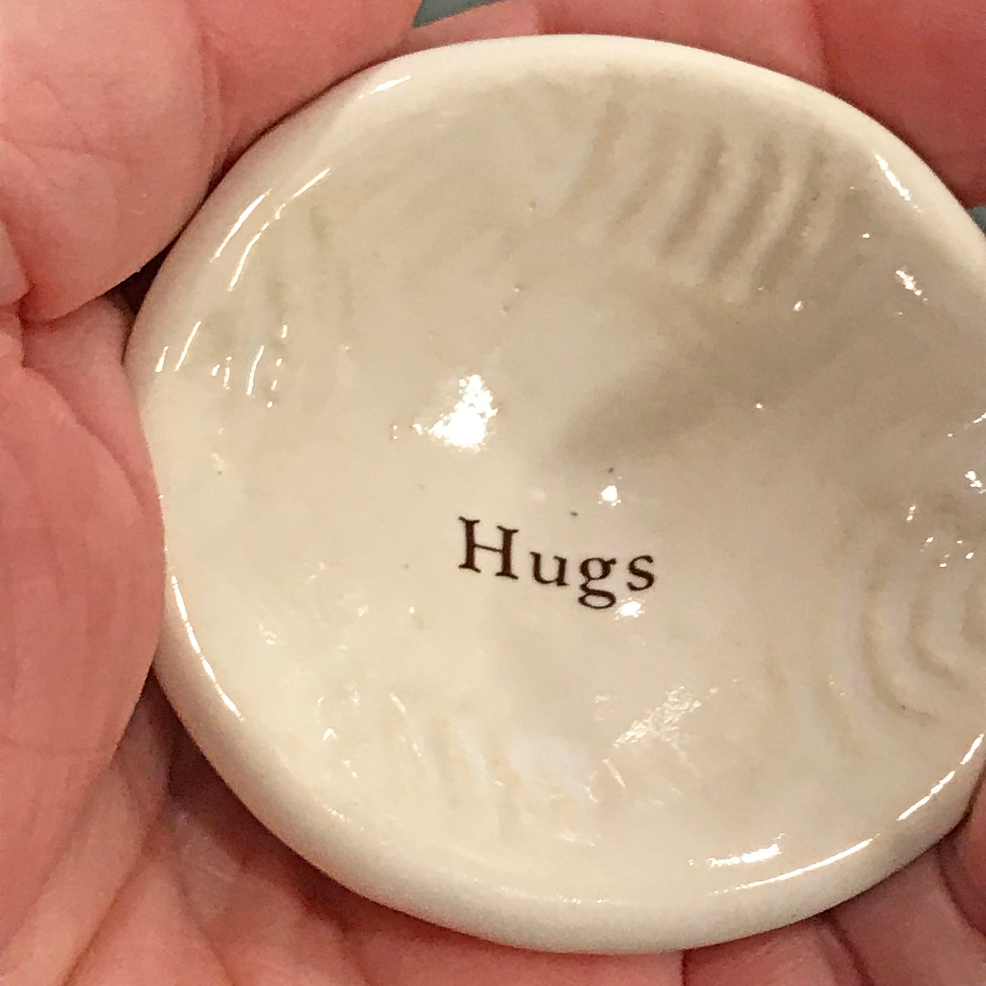 Giving Bowl with the word "Hugs" is a lovely way of showing your friendship and caring.