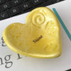 A perfect gift for someone special - this yellow Giving Heart is imprinted with the word &quot;Shine&quot;.