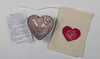 Giving Heart and handprinted gift bag. Shown in purple glaze with the words &quot;Sister Love&quot; 