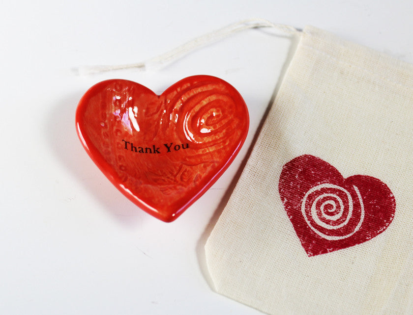 A coral Giving Heart &quot;Thank You&quot; comes with a hand printed gift bag