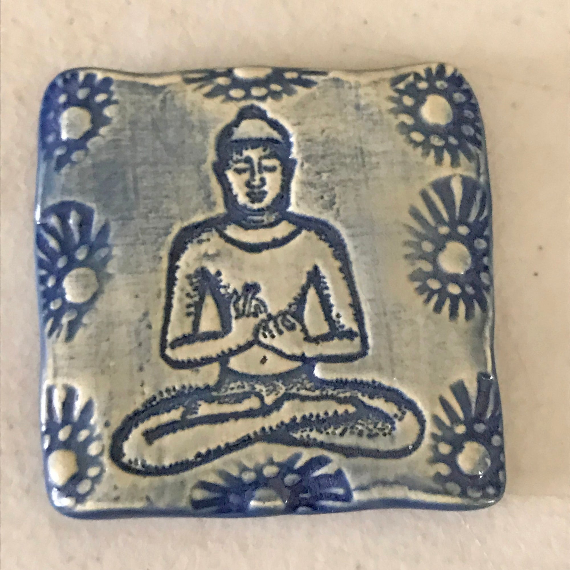 Magnet with Buddha image.  Handmade and created by the artisans of Oerth Studio.