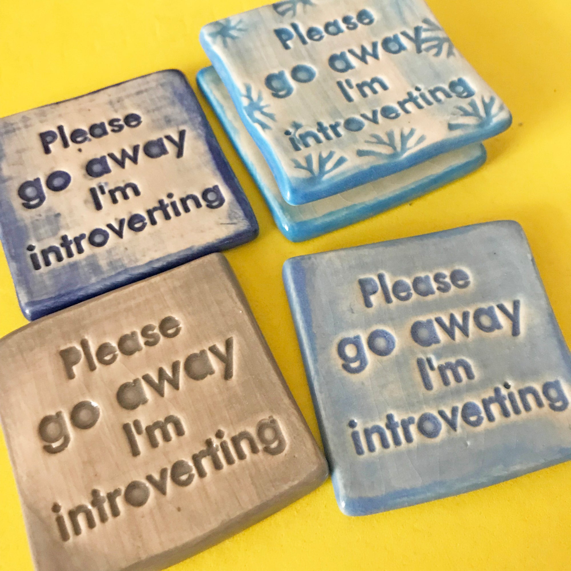 Attention introverts, this magnet is for you.  It says, "Please go away I'm introverting".