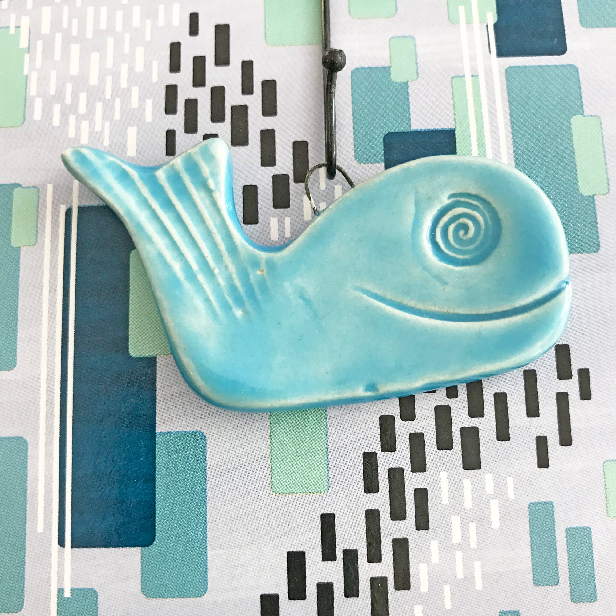 Handmade Whale Ornament glazed in turquoise blue .  Has a big smile and a happy life. 
