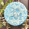 A tree ornament that makes perfect year round decor because it is charming, a pretty blue, and an uplifting style.  It will make you  smile.