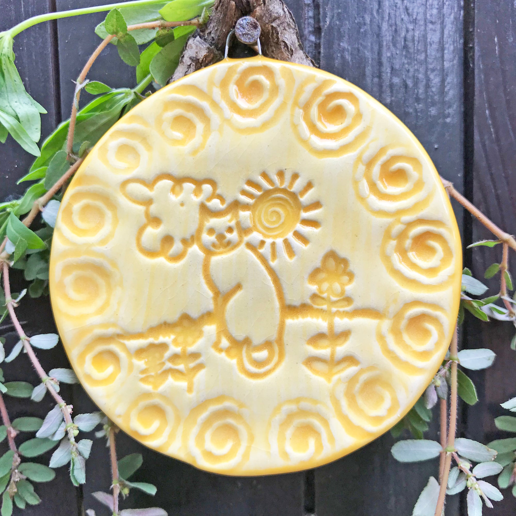 Yellow glaze is the perfect color for our "Cat in the Sun" ornament.  Use for the Christmas Tree or display all year long.  