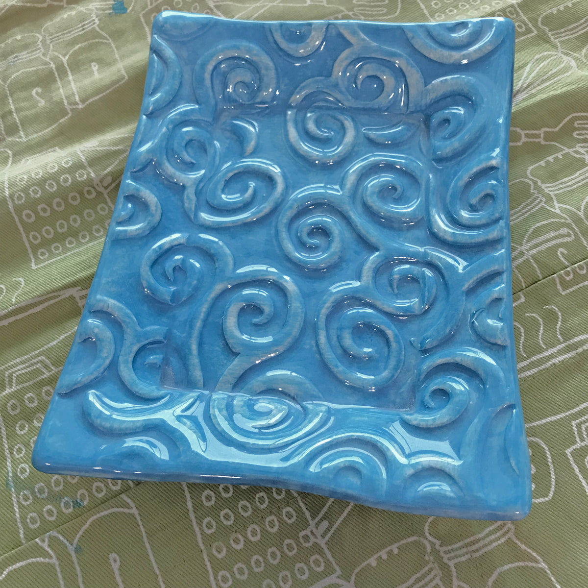 Spiral Pattern On Handcrafted Tray Created From Earthenware Clay. 