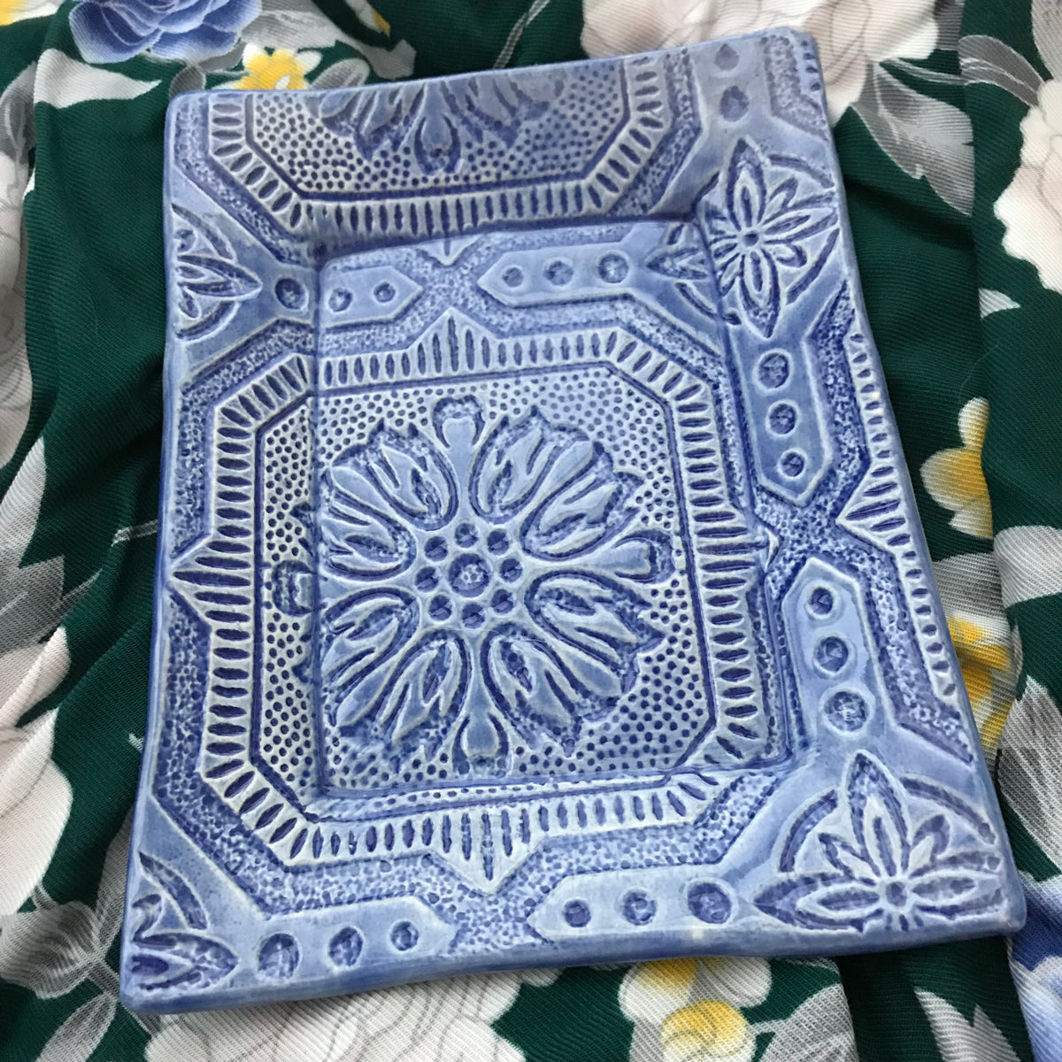Indigo Blue Is A Trending Blue in Decor And Ceramics.  Ours Is  Used To Highlight Our Handmade Tray Created By The Potters Of Lorraine Oerth Studio.