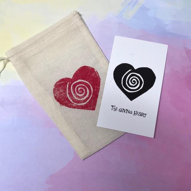 Giving Hearts come packaged in a drawstring bag with a story card that completes the gift.  