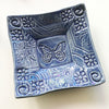 Butterfly design pottery dish handmade by Lorraine Oerth.