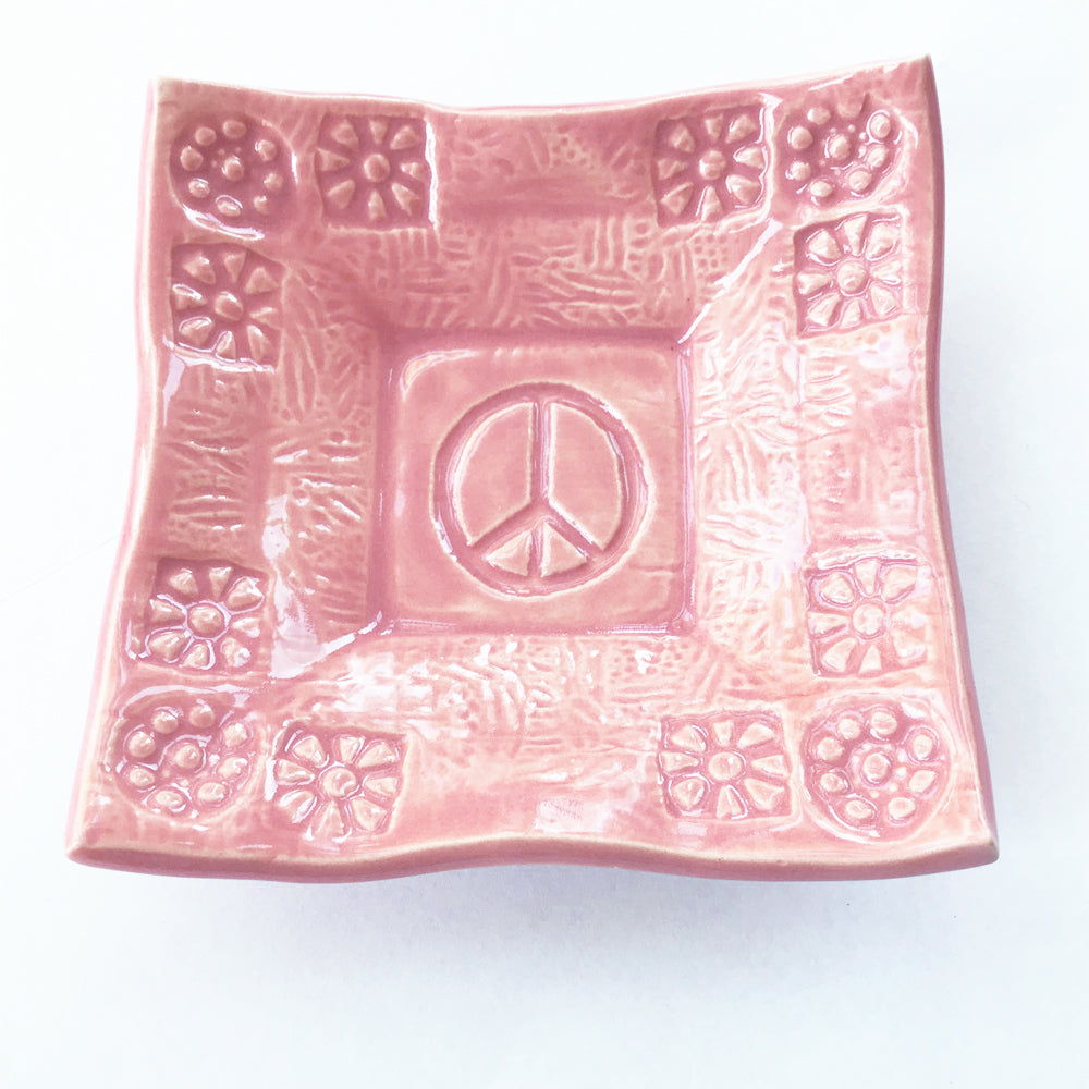 Peace Symbol pottery dish by Lorraine Oerth.