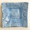 Ceramic Buddha dish glazed in blue grey.